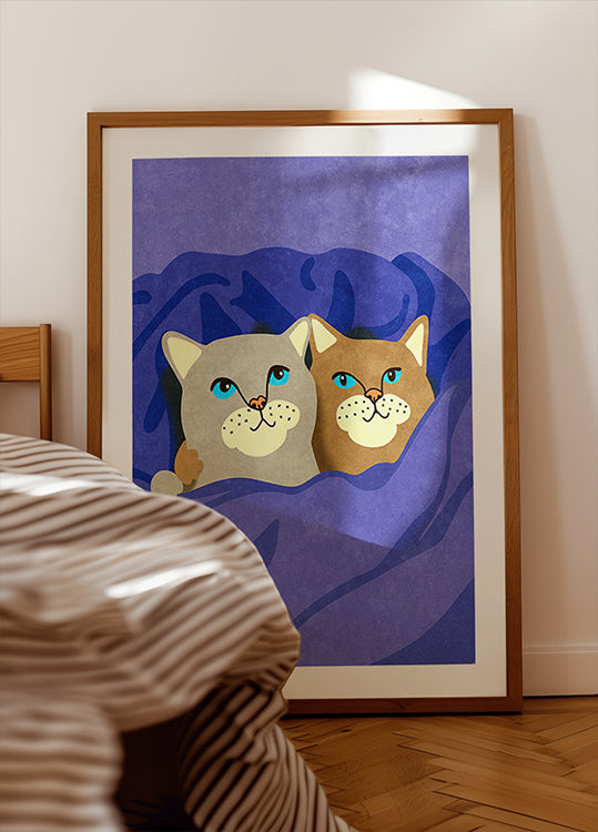 Katten in bed