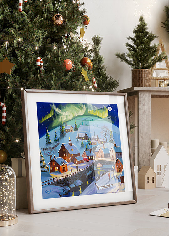 Winterwonderlanddorp onder de poster van het noorderlicht