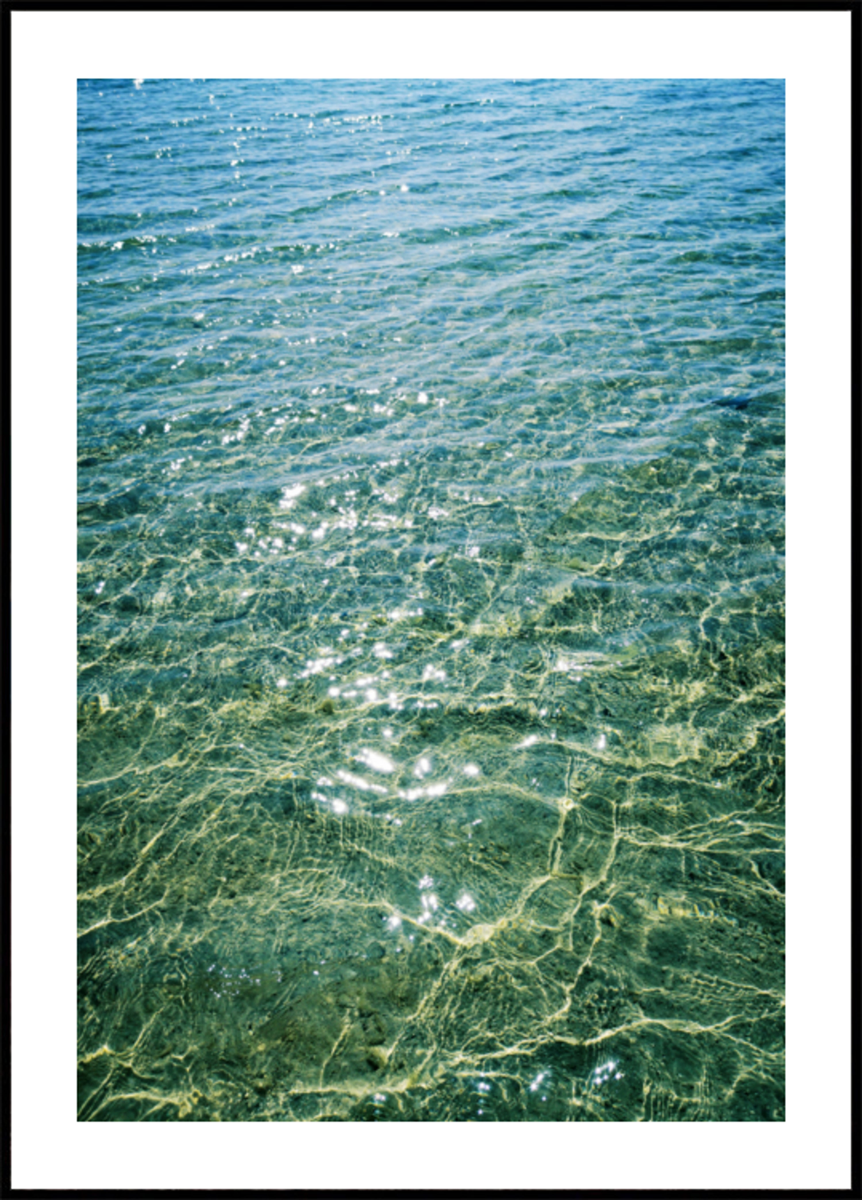 Zonlicht op helder water